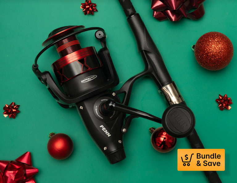 Fishing rod and reel set on a green background with Christmas decorations