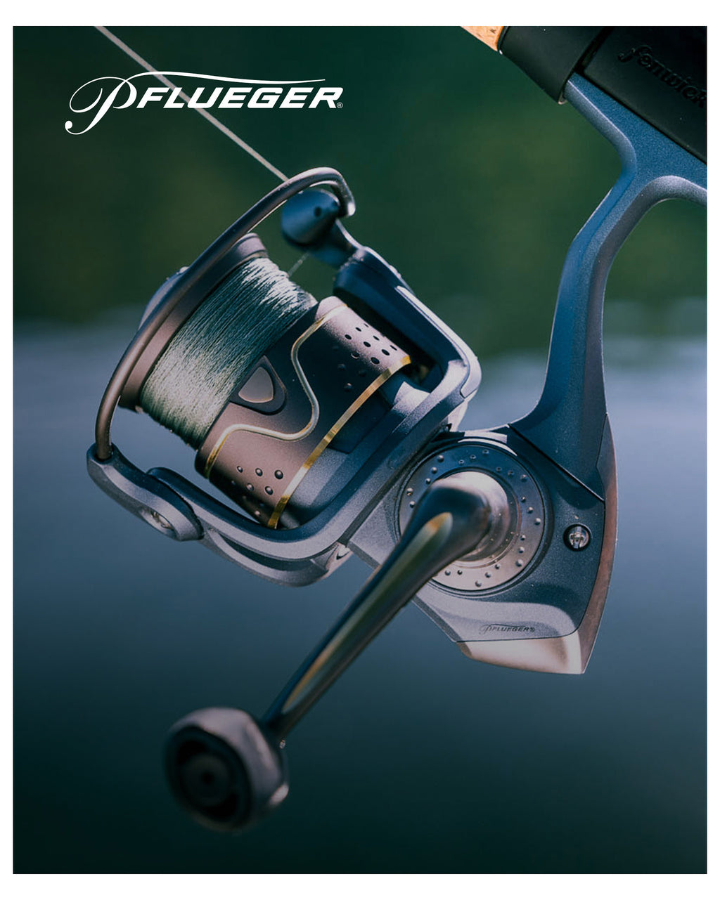 Fishing reel with visible brand logo on a blurred natural background